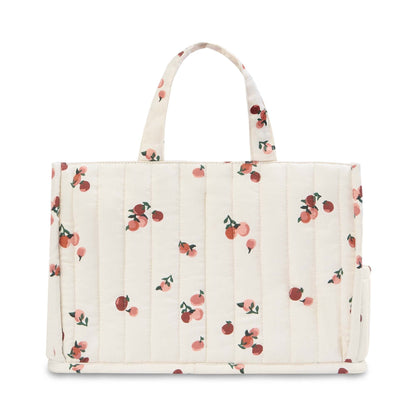 Quilted tote bag with cherry pattern on a white background
