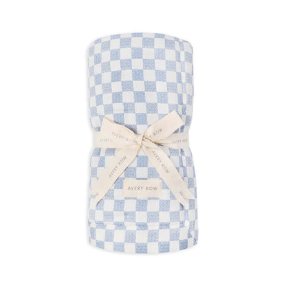 Checkered blanket with a bow and 'Avery Row' label on a white background
