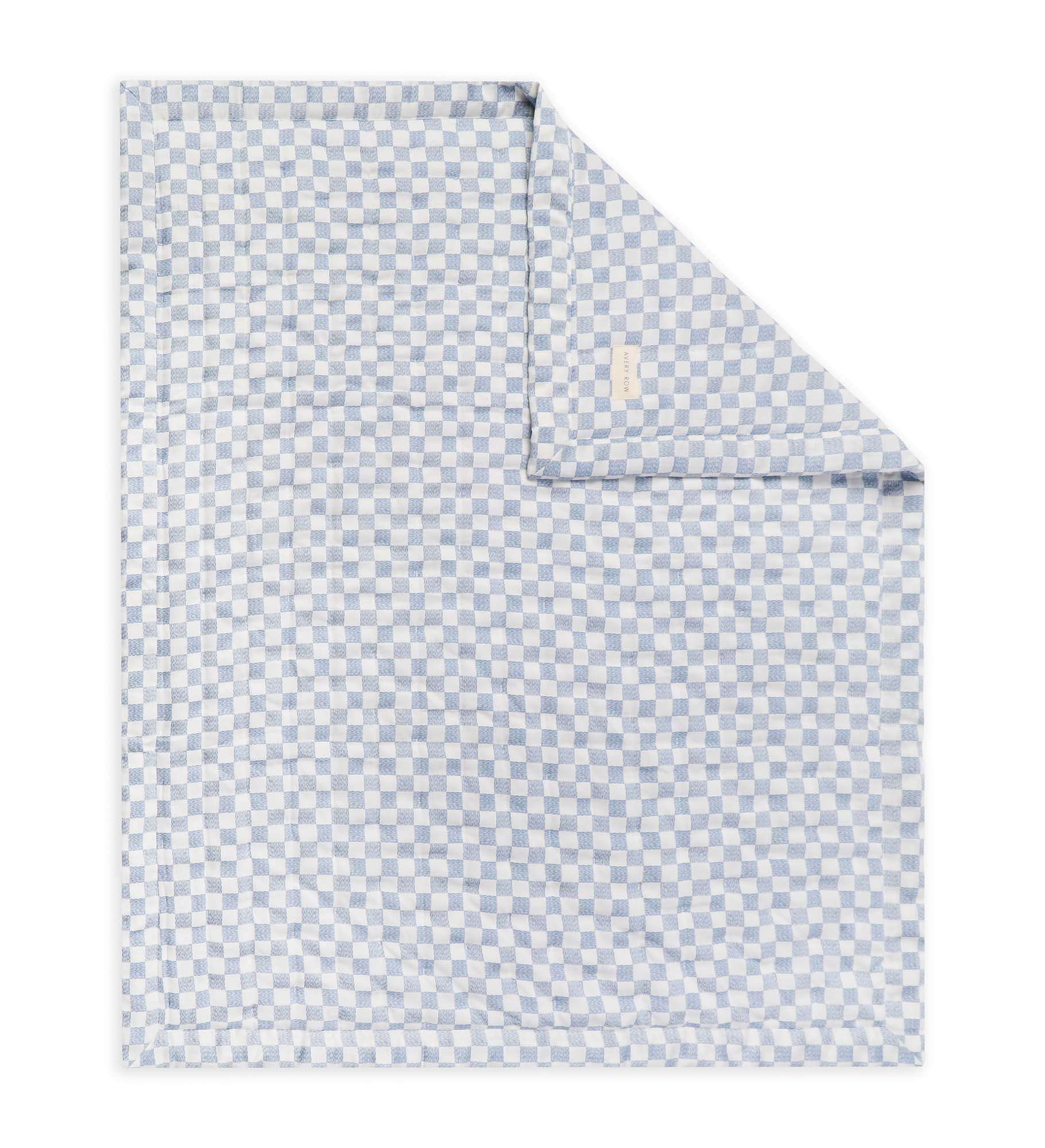 Blue patterned blanket on a white background