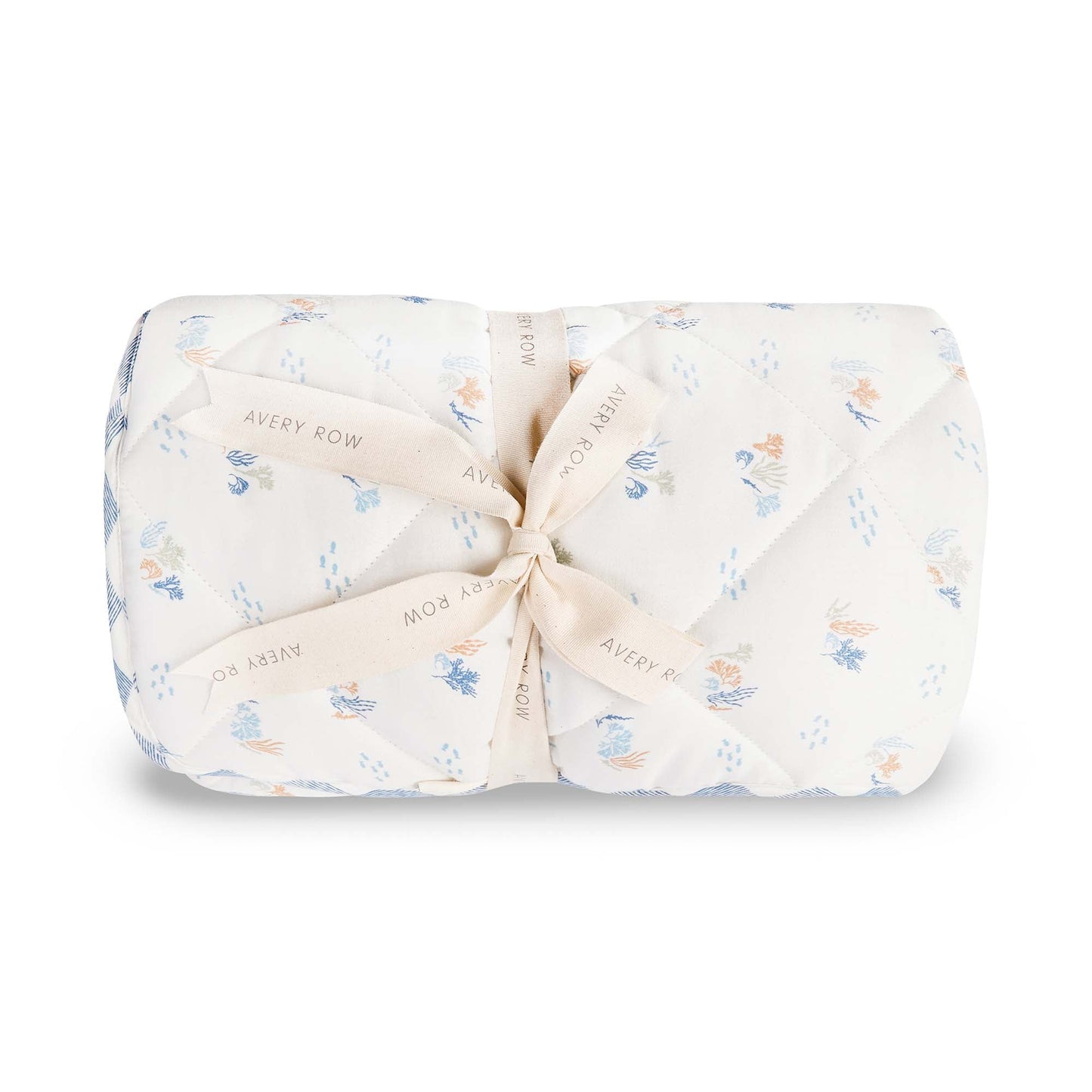 Folded baby blanket with floral pattern and tied bow on a white background