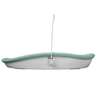 Green changing pad with a hook on a white background