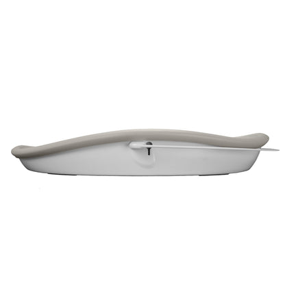 Beige changing pad with a hook on a white background