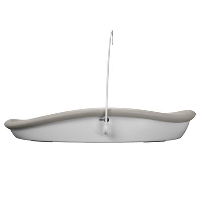 Beige changing pad with a hook on a white background