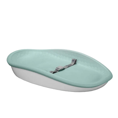 Green changing pad with a hook on a white background