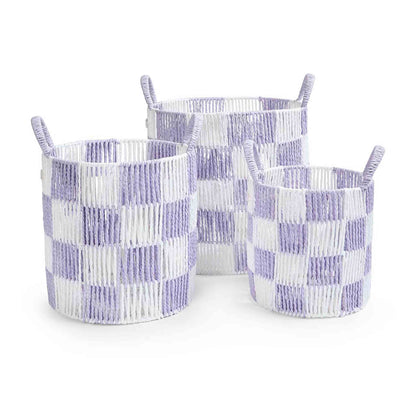 Three woven baskets with a checkered pattern in purple and white on a white background