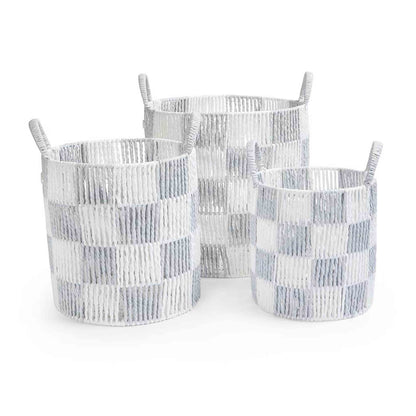 Three woven baskets with a checkered pattern on a white background