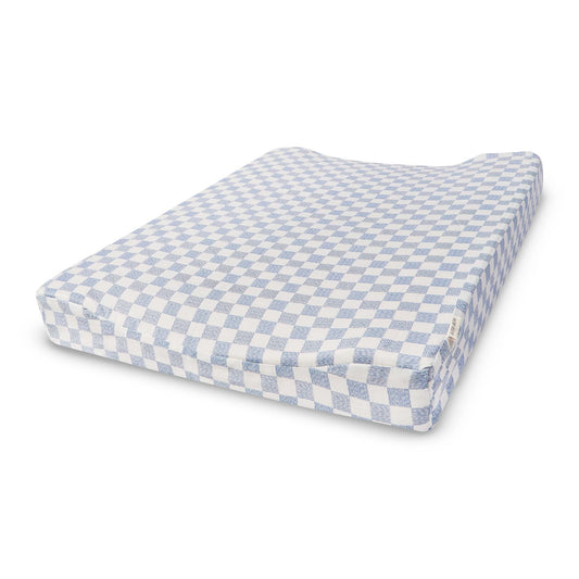 Checkered cushion with blue and white pattern on a white background