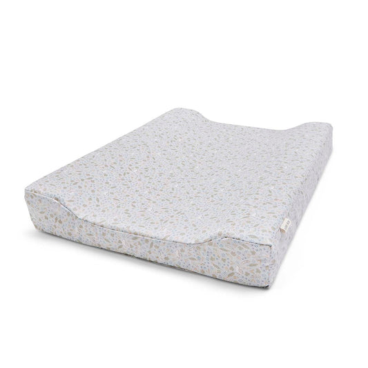 Gray textured changing pad on a white background