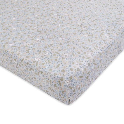Floral patterned fitted sheet on a white background