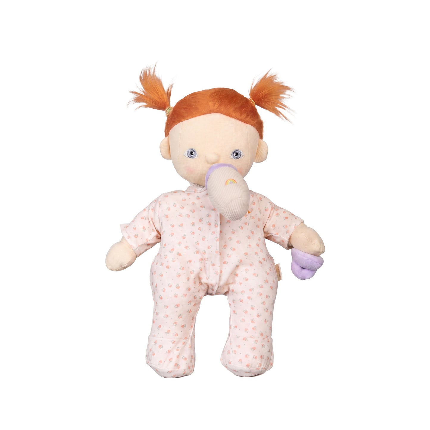 Stuffed doll with red hair in pigtails wearing a pink outfit on a white background