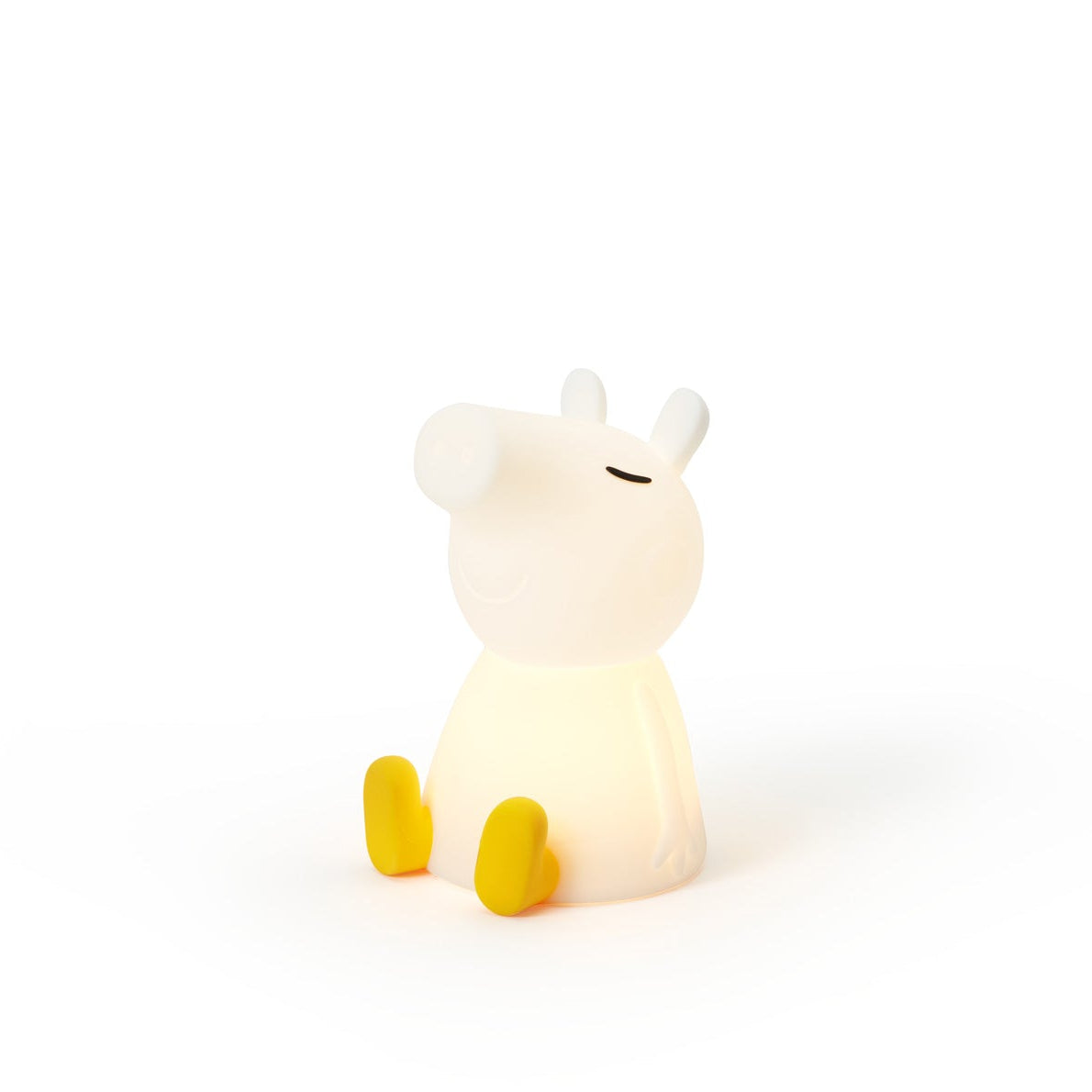 White night light shaped like a cartoon character on a white background