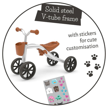 Children's tricycle with solid steel V-tube frame and stickers for customization on a white background.