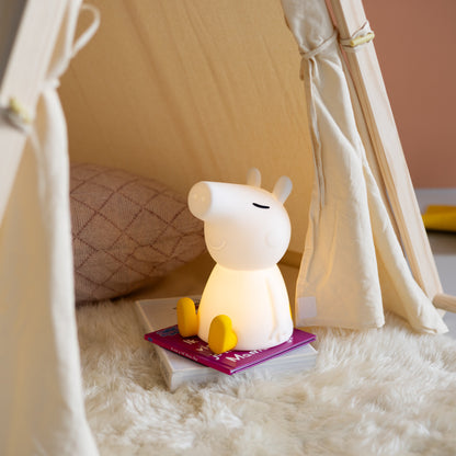 Children's night light shaped like a cartoon character inside a teepee.