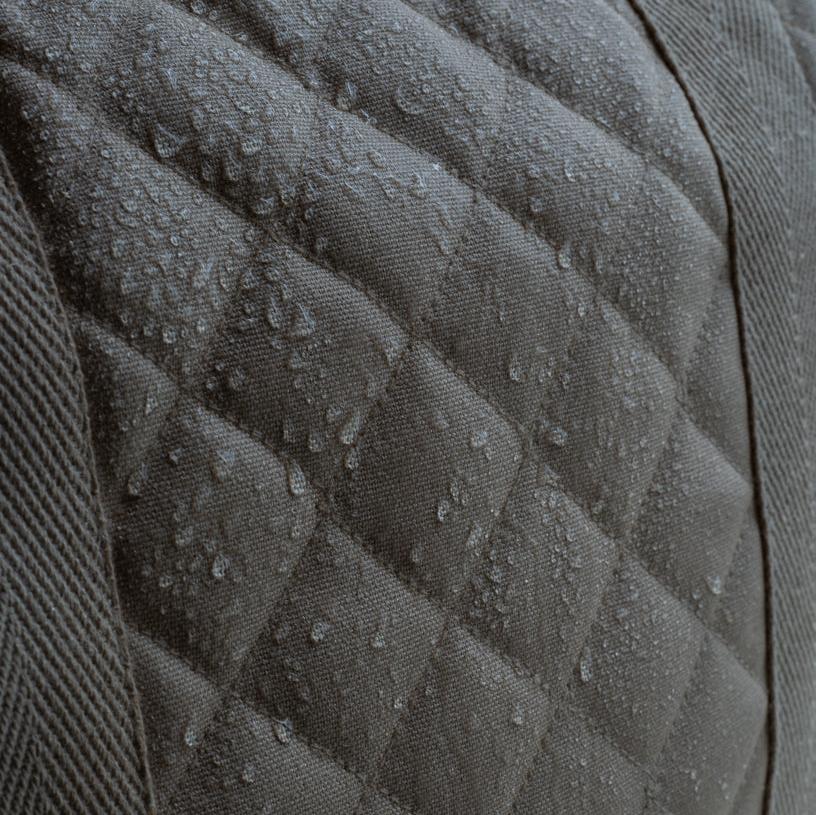 Close-up of a textured gray fabric surface