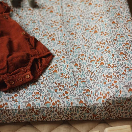 Brown fabric with a floral pattern on a matching background