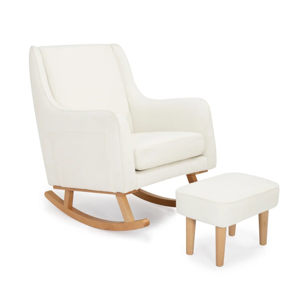 White rocking chair with ottoman on a white background