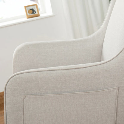 Close-up of a light gray upholstered chair with a blurred background
