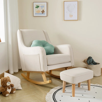 White rocking chair with a green cushion in a nursery setting