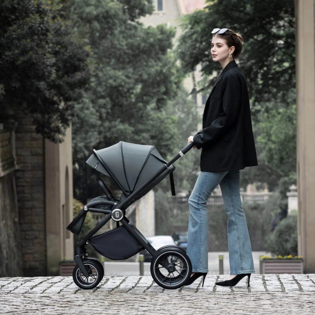 Woman pushing a stroller in an urban setting