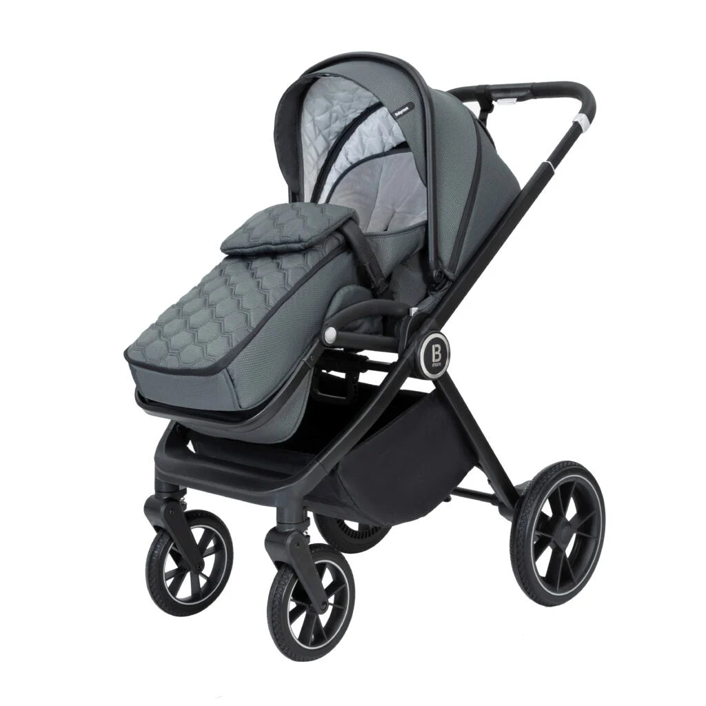 Gray and black baby stroller with quilted seat on a white background