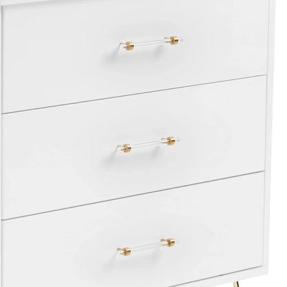 White dresser with gold handles on a white background