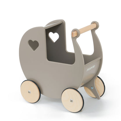 Children's toy stroller with heart cutouts on a white background