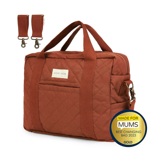 Brown quilted bag with straps and a 'Made for Mums' award badge on a white background