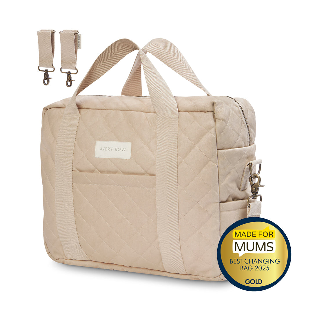 Beige diaper bag with a 'Made for Mums' award badge on a white background