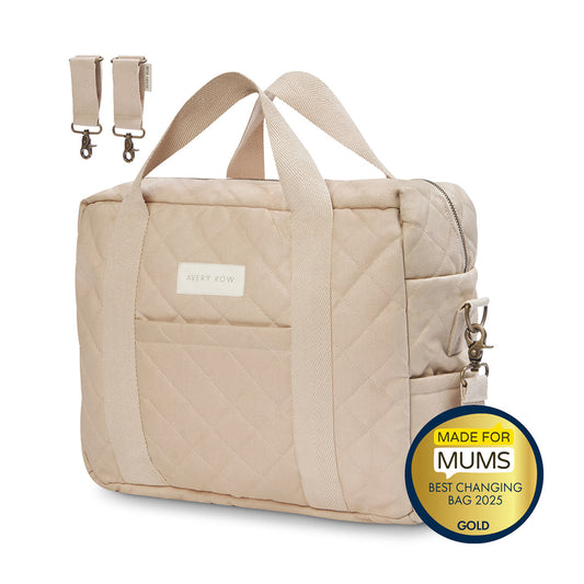 Beige diaper bag with a 'Made for Mums' award badge on a white background