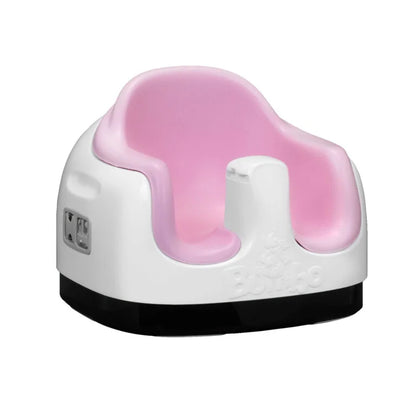 Pink and white baby seat on a white background