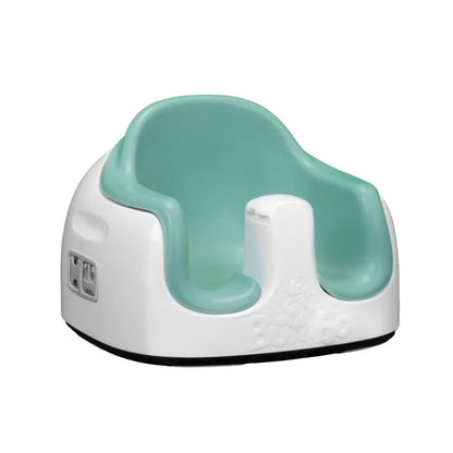 Children's potty seat with teal seat and white base on a white background