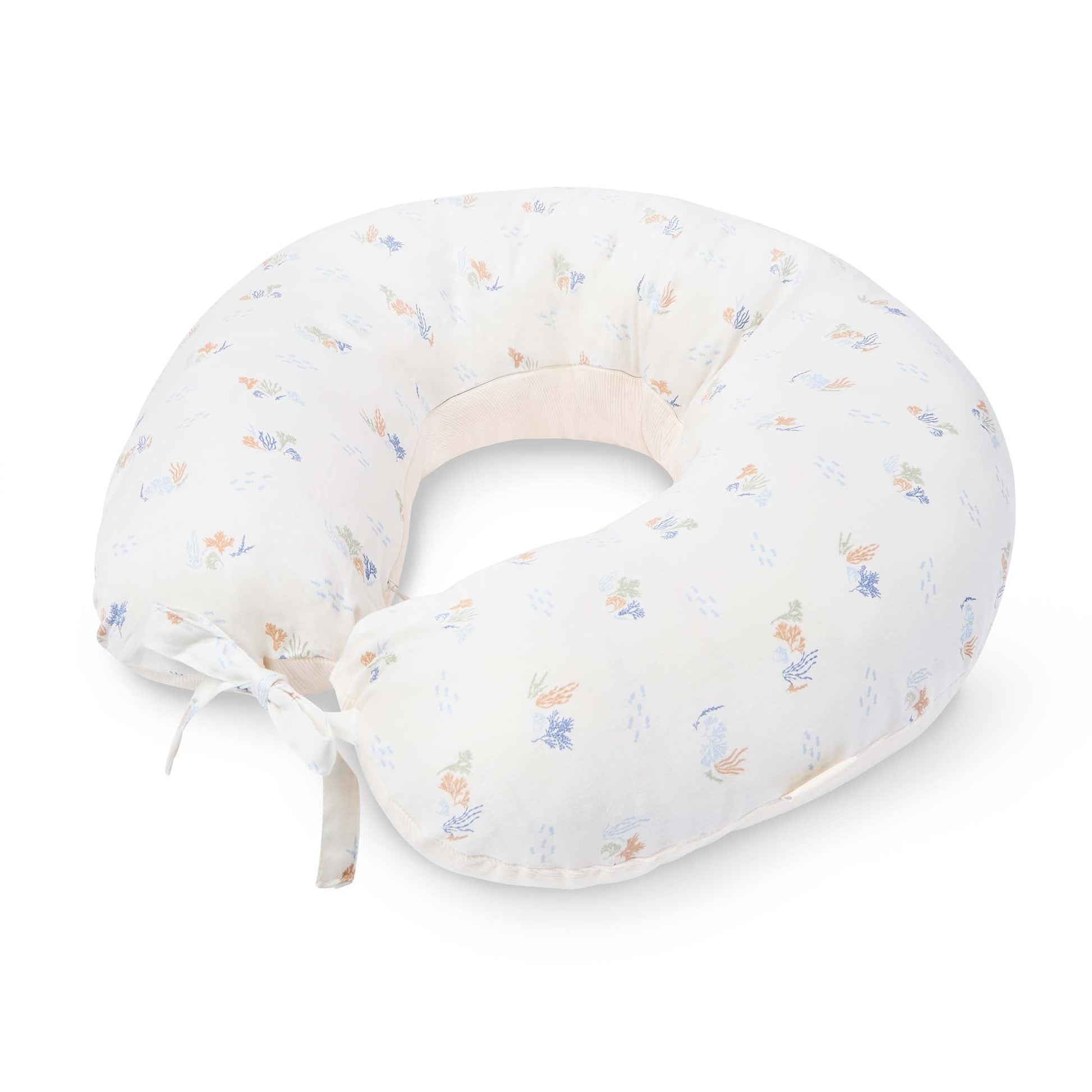 Baby boppy pillow with floral pattern on a white background