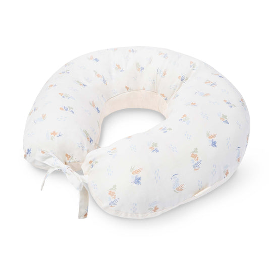 Baby boppy pillow with floral pattern on a white background