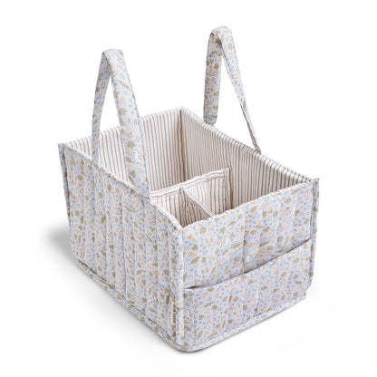 Fabric storage basket with floral pattern on a white background