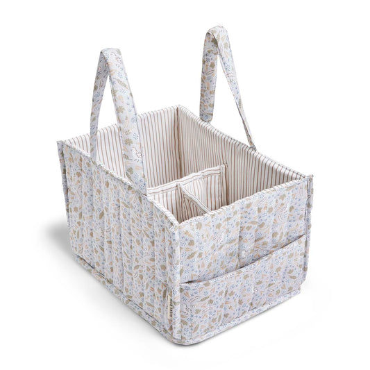 Fabric storage basket with floral pattern on a white background