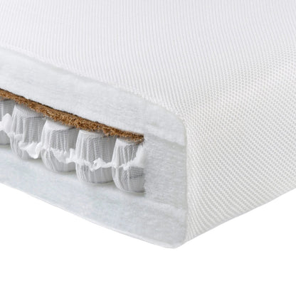 Close-up of a mattress with a visible layer of cork and organic material.