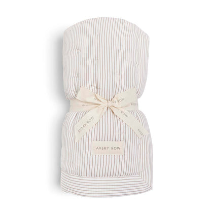 Striped fabric bundle with a bow and 'Avery Row' label on a white background