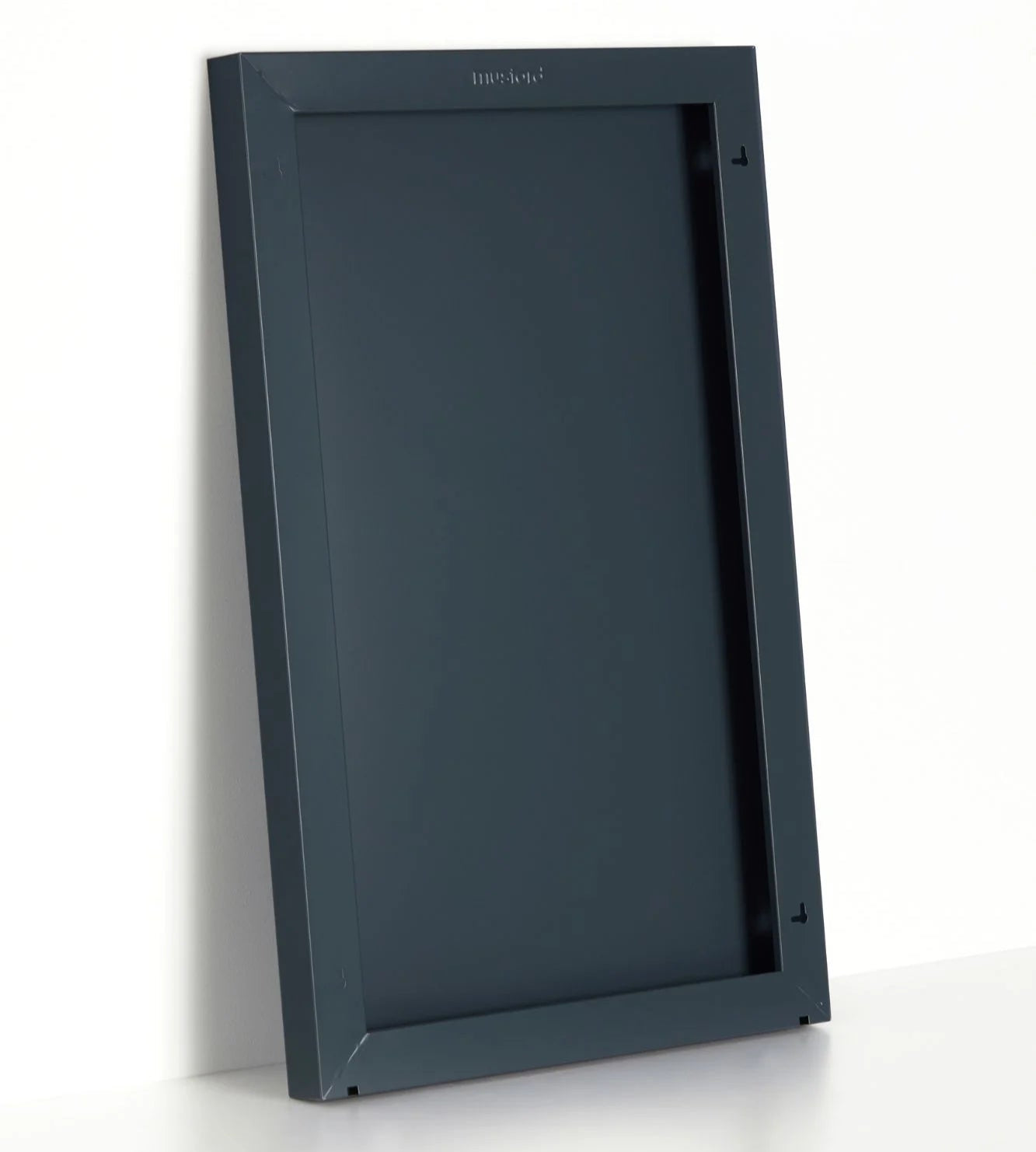 Dark gray electronic device on a white background