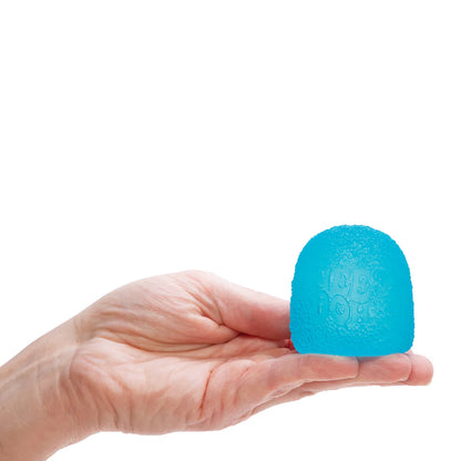 Hand holding a blue object against a white background
