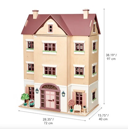 Model of a multi-story house with dimensions indicated on a white background