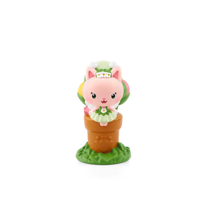 Toy figure of a pink cat-like creature in a pot on a white background