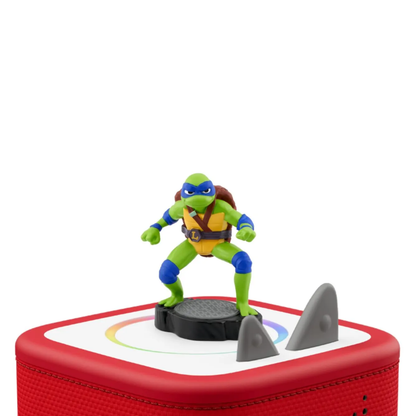 Toy figure on a red platform with a white background
