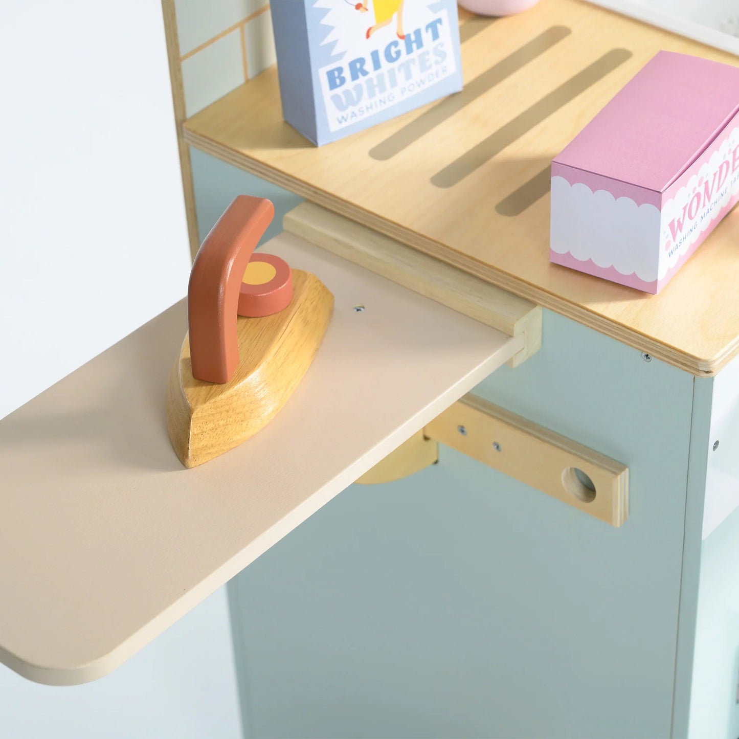 Children's play kitchen set with wooden counter and shelves on a white background