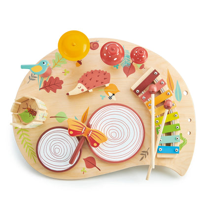 Colorful wooden play set with various animal figures and musical instruments on a white background