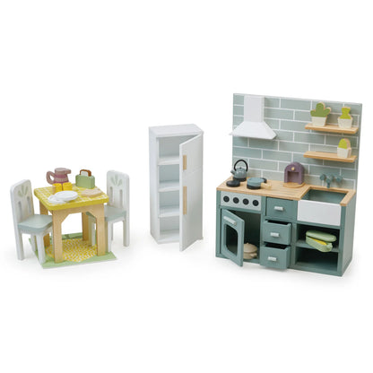 Toy kitchen set with furniture and accessories on a white background