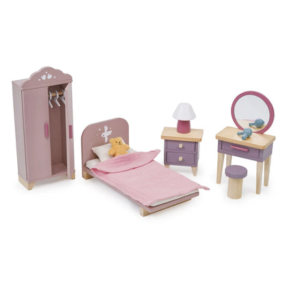 Wooden dollhouse bedroom set with pink bed, wardrobe, and furniture on a white background
