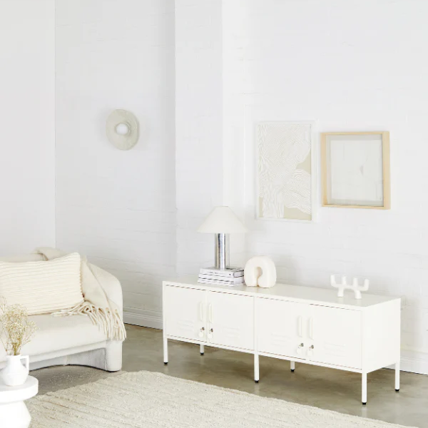 Minimalist living room with white furniture and decor