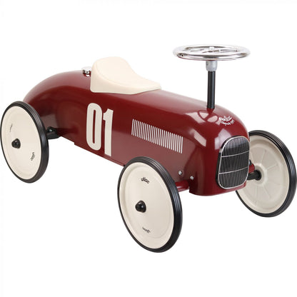 Burgundy ride on toy car on white background