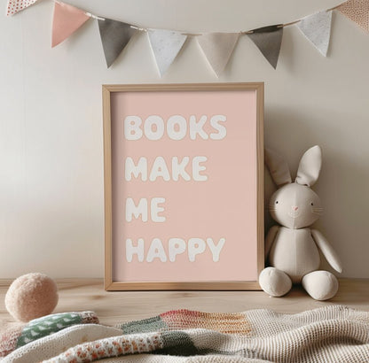 Framed poster with 'Books Make Me Happy' text, plush rabbit toy, and colorful pennant banner on a shelf.