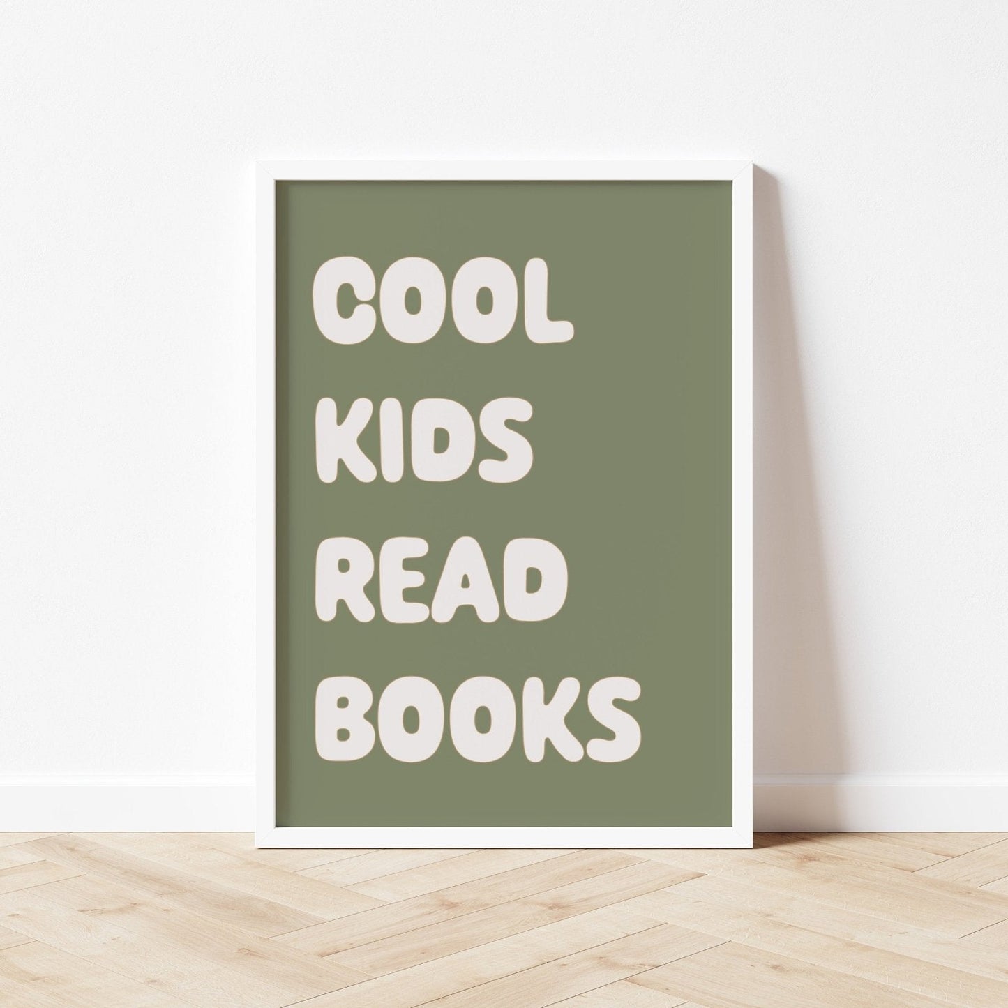 Poster with 'Cool kids read books' text on a green background